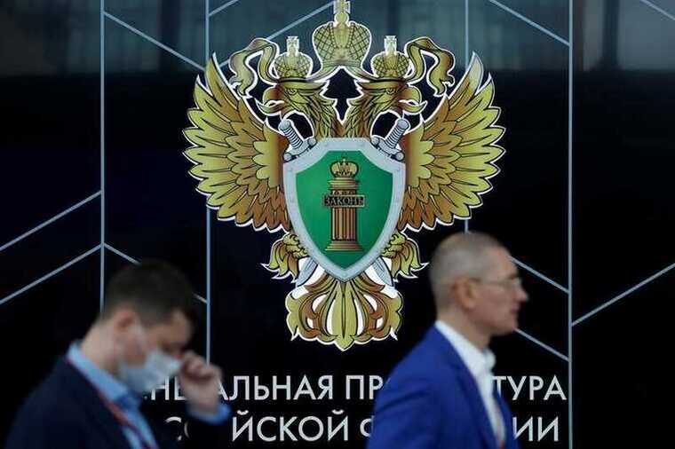 В Вильнюсе активисты показали новый знак российской оппозиции, вдохновленный андреевским крестом